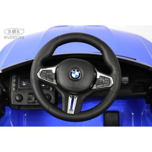 Детский электромобиль BMW M4 RiverToys A004AA синий фото 7