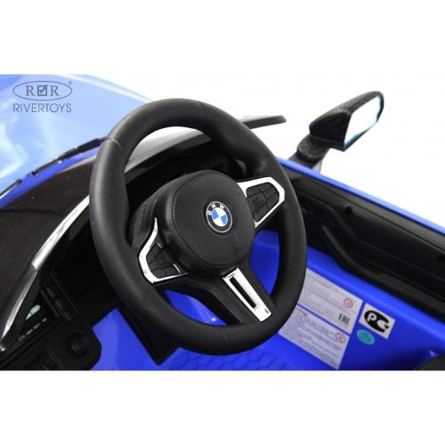 Детский электромобиль BMW M4 RiverToys A004AA синий фото 3
